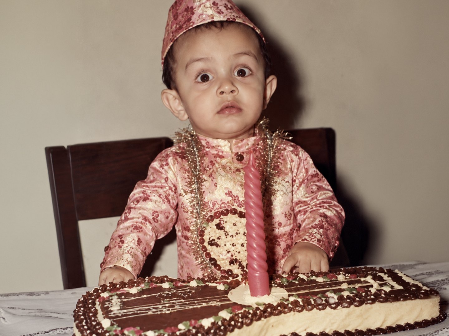 Ahmer Kalam as a toddler at a birthday celebration